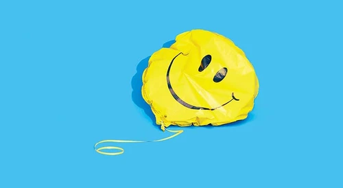 Deflated smiley face balloon. (Photograph by Daniel Ehrenworth)
