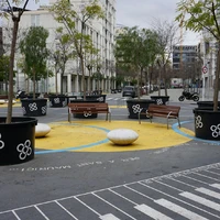 a group of benches sitting in the middle of a park