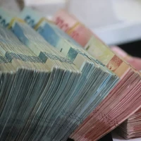 money which is the medium of exchange in Indonesia