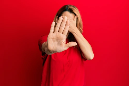 Hispanic,Young,Woman,Wearing,Casual,Red,T,Shirt,Covering,Eyes